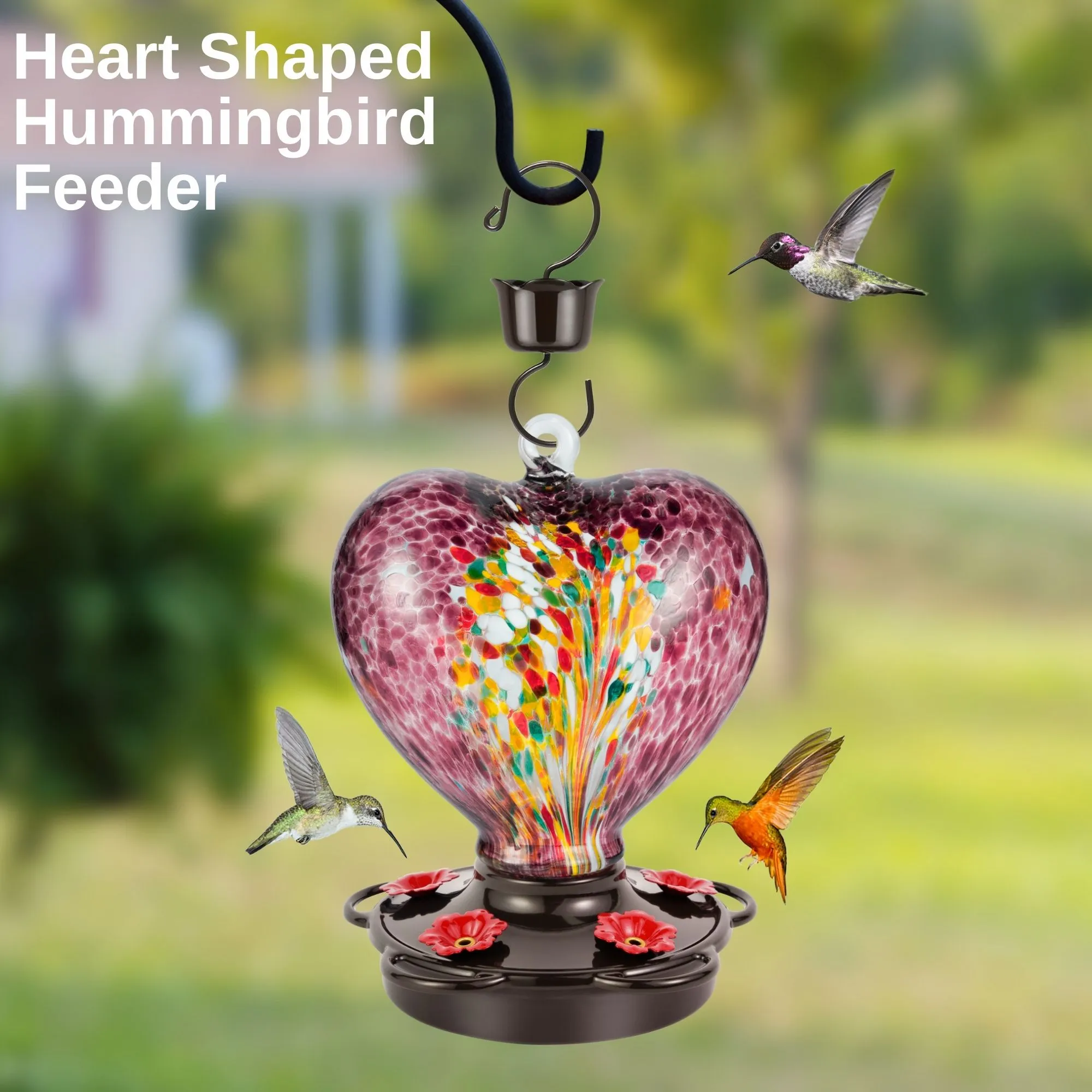 Purple heart-shaped hummingbird feeder for outdoor use showcasing a 28 fl. oz capacity crafted with a rust-proof metal cover and leak-proof base to prevent spills perfect for inviting hummingbirds with its eye-catching design